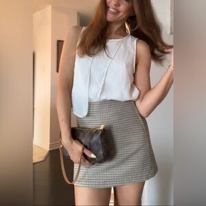 White sleeveless blouse